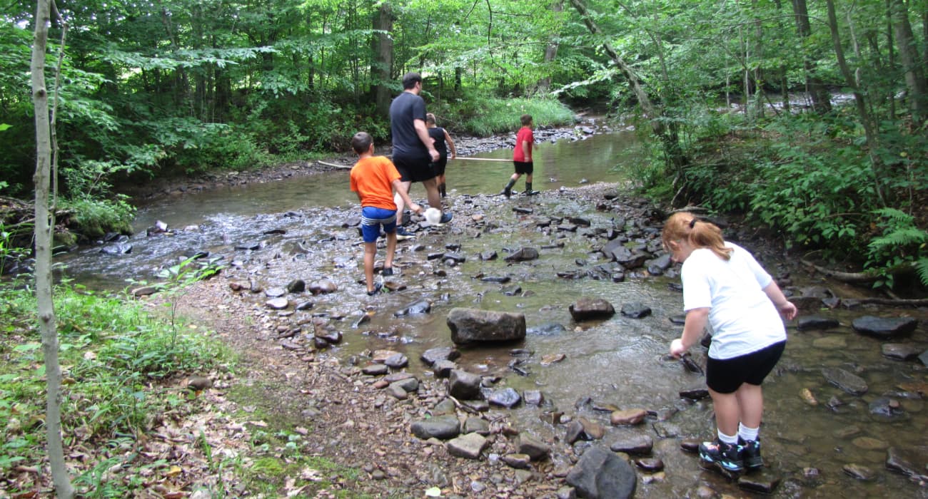 kids near a stream